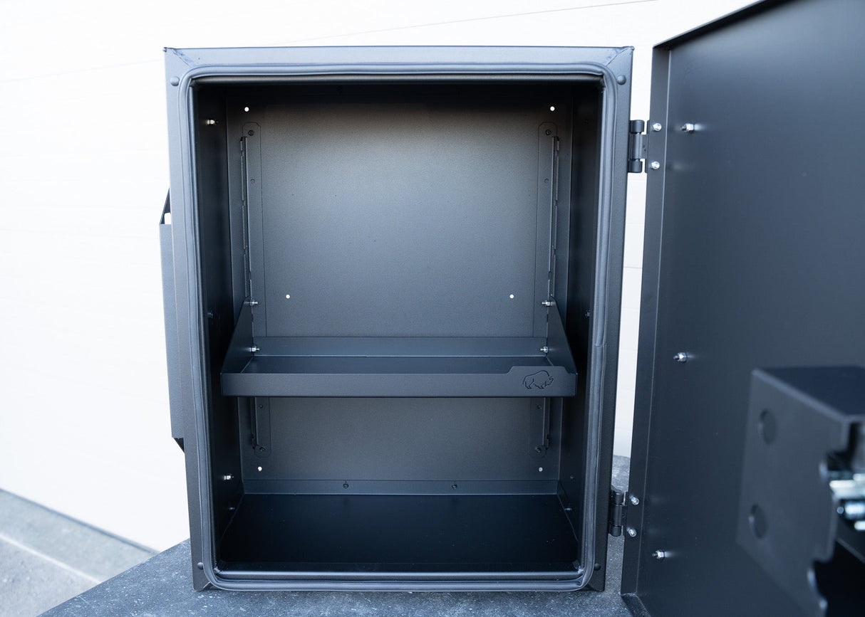 Interior view of the Universal Aluminum Storage Box showcasing the adjustable shelf, highlighting its spacious, organized layout and durable aluminum construction designed for secure storage of tools, gear, or a portable generator.