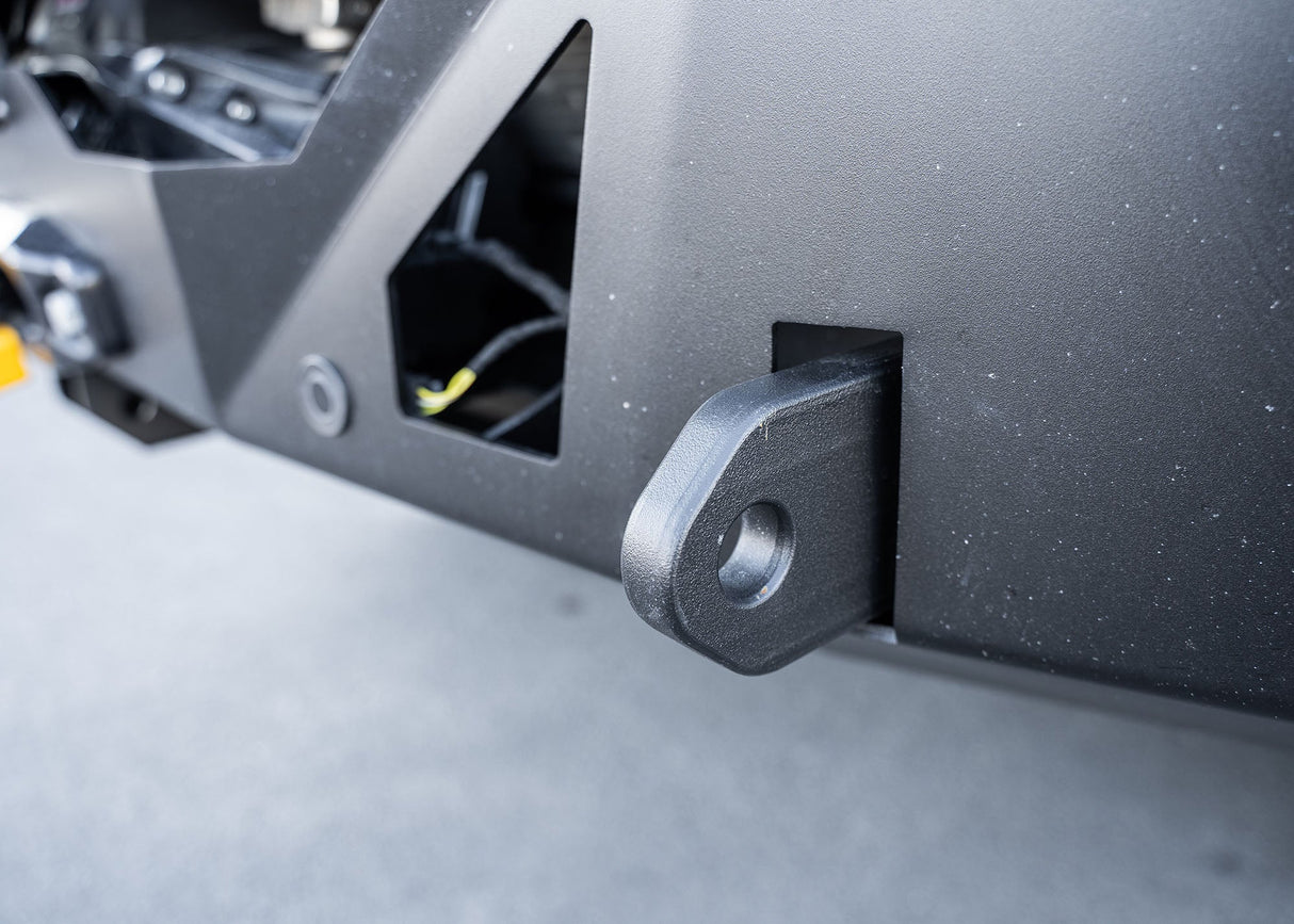 Close-up of the ROAMBUILT LoPro Front Bumper's 1-inch thick steel shackle mount encased within a lightweight 5052 aluminum outer shell, highlighting the bumper's hybrid construction and rugged design.