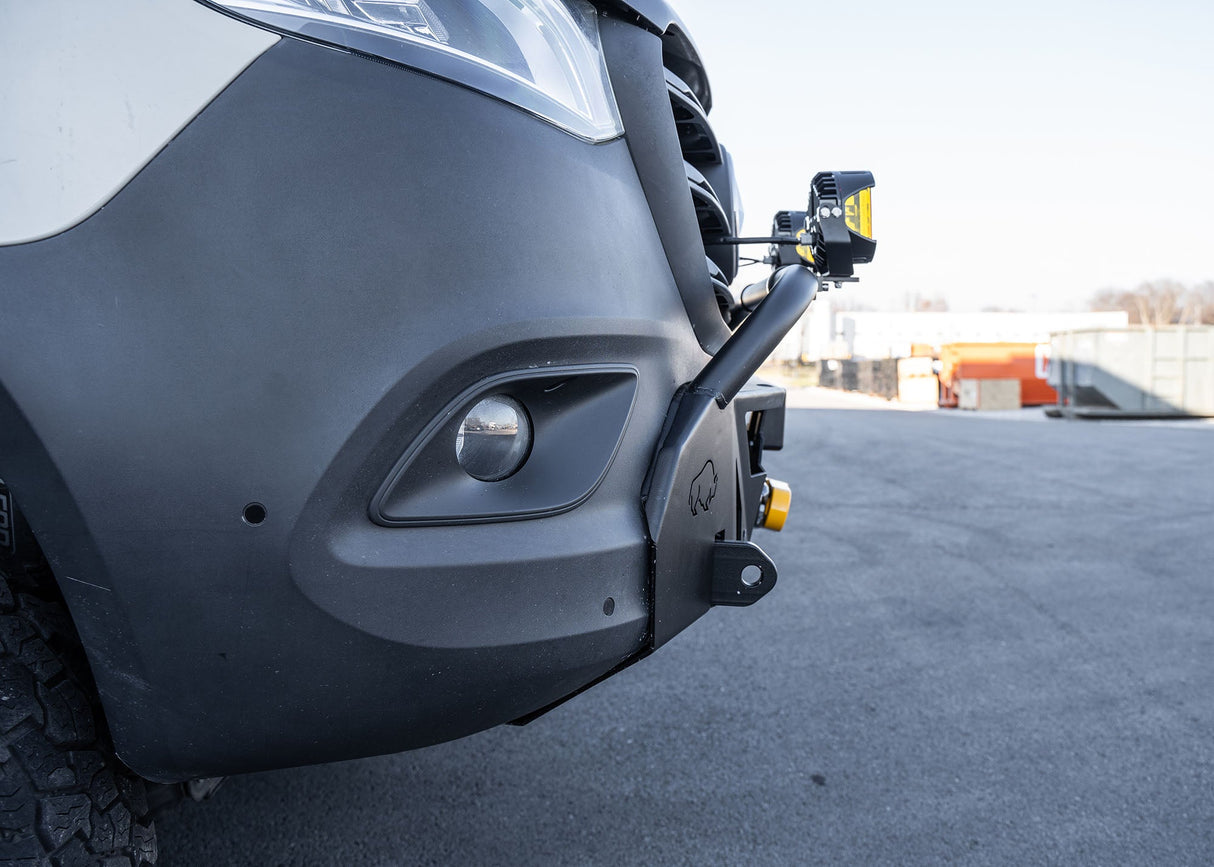 Side profile of a Mercedes-Benz Sprinter van featuring the ROAMBUILT LoPro Front Bumper, highlighting its lightweight aluminum shell and snug fit that adds only 3 inches of bulk, seamlessly aligning with the vehicle's body lines.