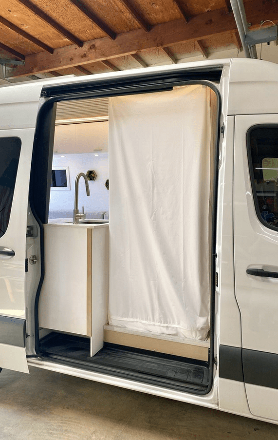 RV Hidden Stainless Steal Shower Pan (Shower in Use) - Campervan HQ