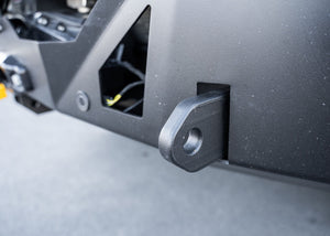 Close-up of the ROAMBUILT LoPro Front Bumper's 1-inch thick steel shackle mount encased within a lightweight 5052 aluminum outer shell, highlighting the bumper's hybrid construction and rugged design.