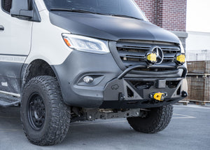 Side profile of a Mercedes-Benz Sprinter van showcasing the ROAMBUILT LoPro Front Bumper, highlighting its lightweight aluminum shell, integrated bull bar, and seamless fit that adds only 3 inches of bulk, aligning perfectly with the vehicle's body lines.