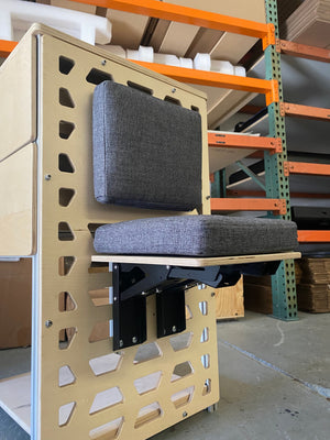 tetravan moab bracket attached to cabinet in campervan with drop down table and drawer system ventilated campervan cabinet 8020 framing jumper seat